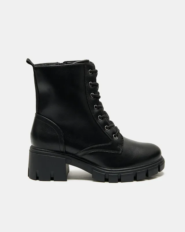 Women Black Solid Biker Boots sold by Redtag