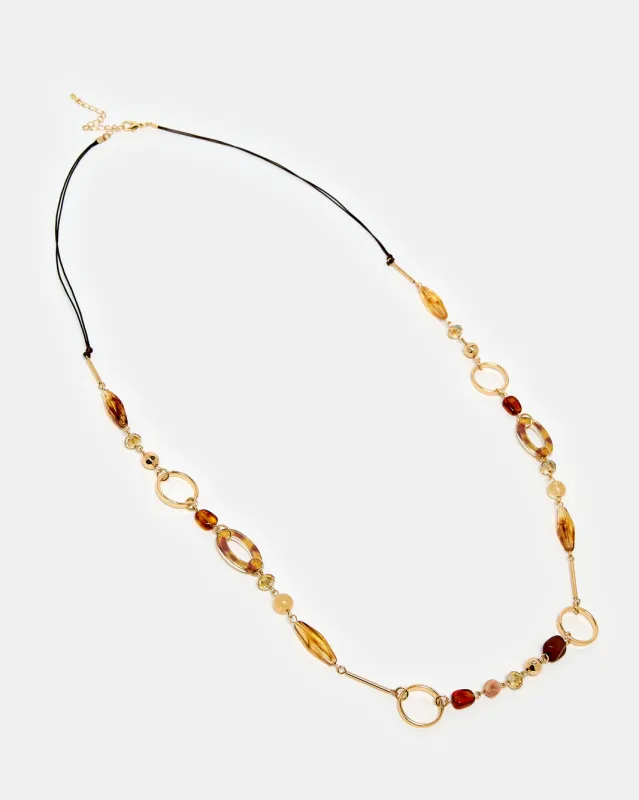 Women Gold Embellished Necklace sold by Redtag