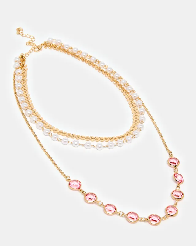 Women Gold And Pink Embellished Layered Necklace sold by Redtag