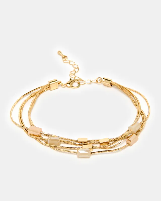 Women Gold Layered Bracelet sold by Redtag