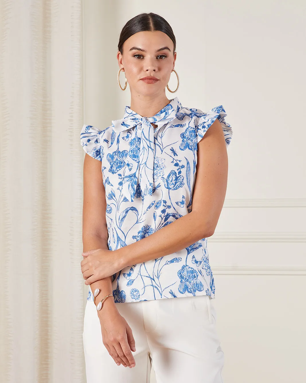 Women White And Blue Printed Casual Blouse sold by Redtag