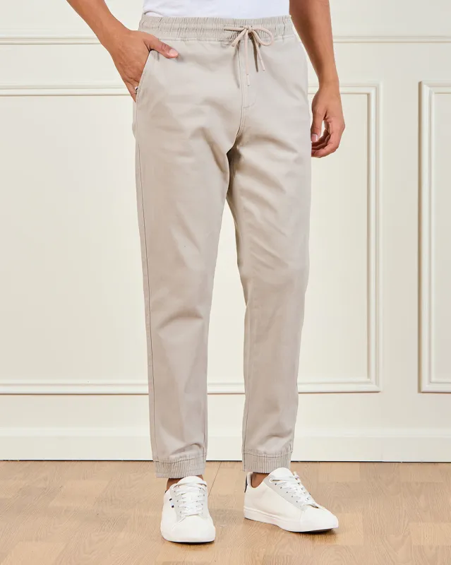 Men Beige Solid Jogger Pants sold by Redtag