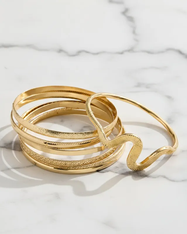 Women Gold Embellished Bangle Set (Pack Of 6) sold by Redtag