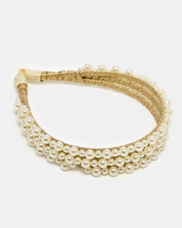 Women White Pearl Head Band sold by Redtag