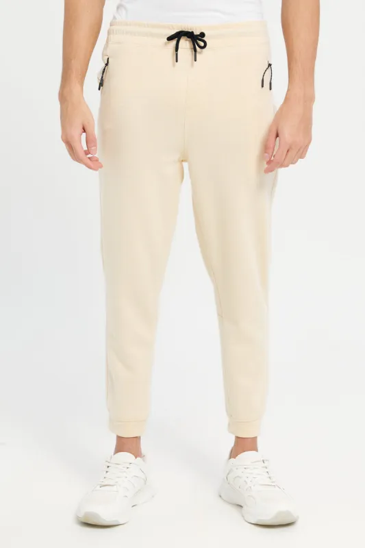 Men Beige Slim Fit Active Pants sold by Redtag