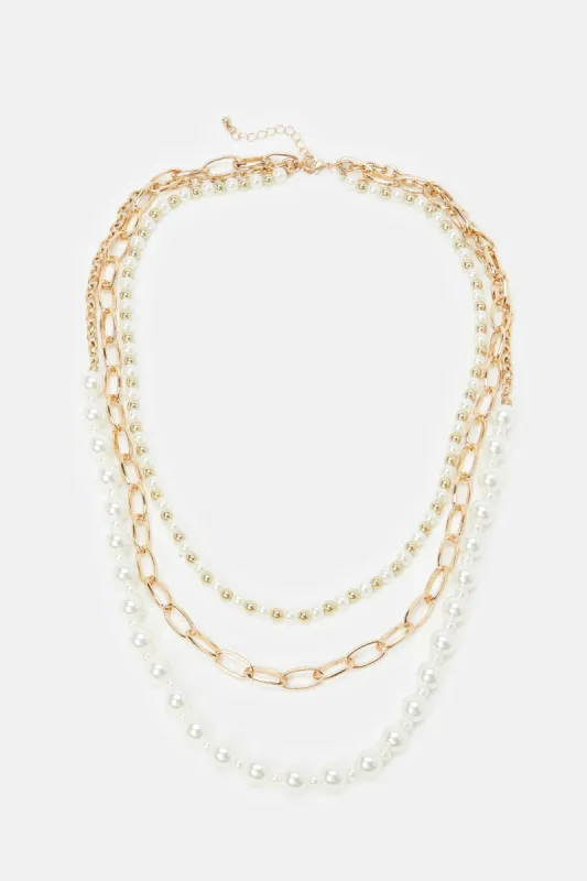 Women White And Gold Pearl Embellished Necklace sold by Redtag