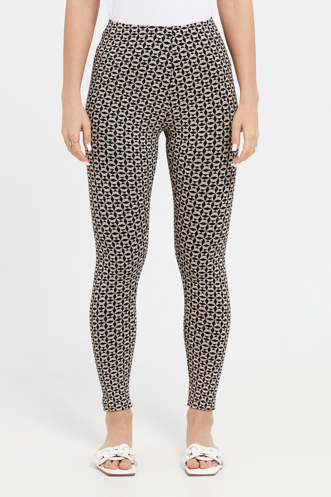 Women Beige And Black Printed Leggings sold by Redtag