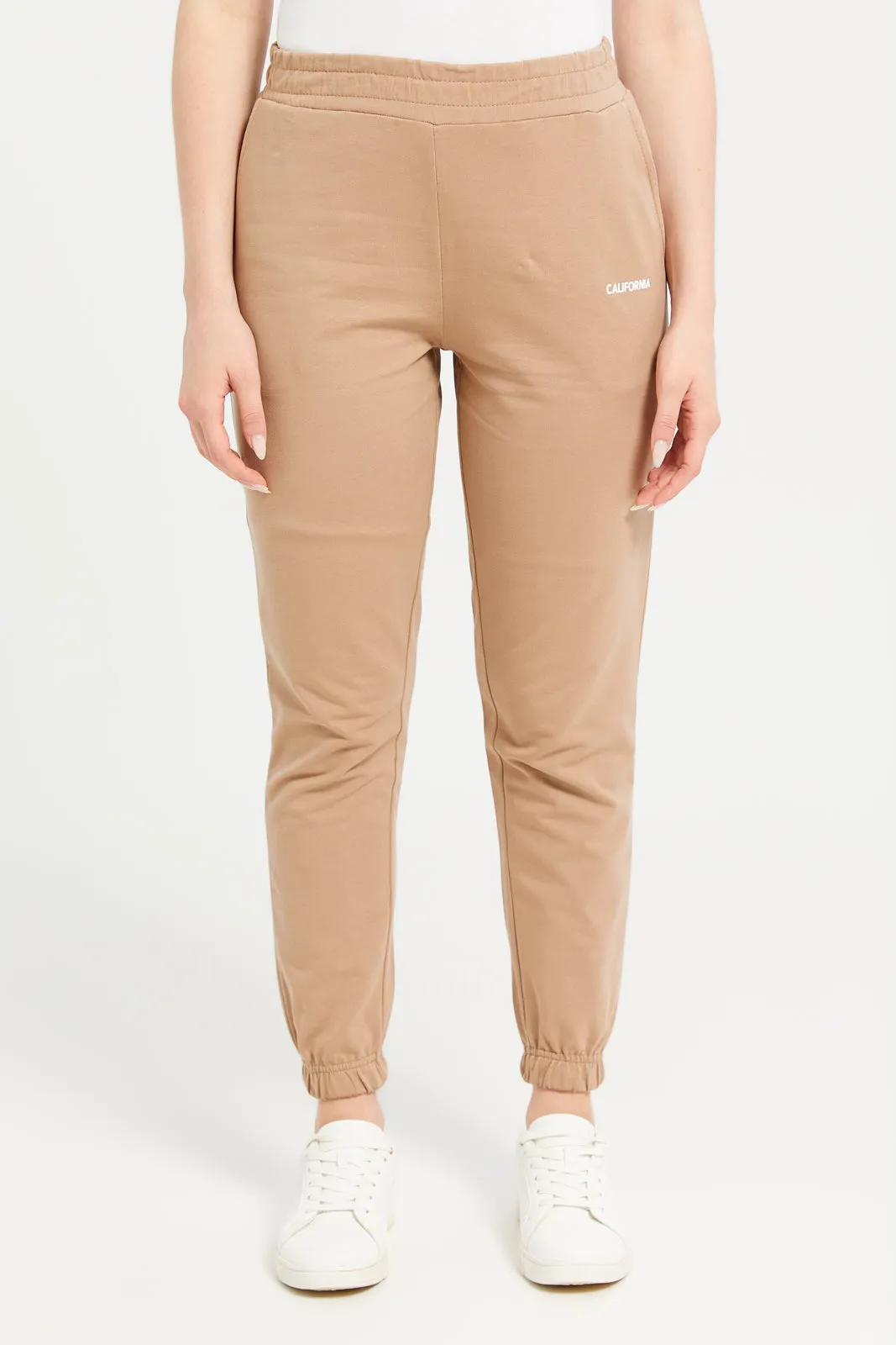 Women Beige Plain Elasticated Joggers sold by Redtag