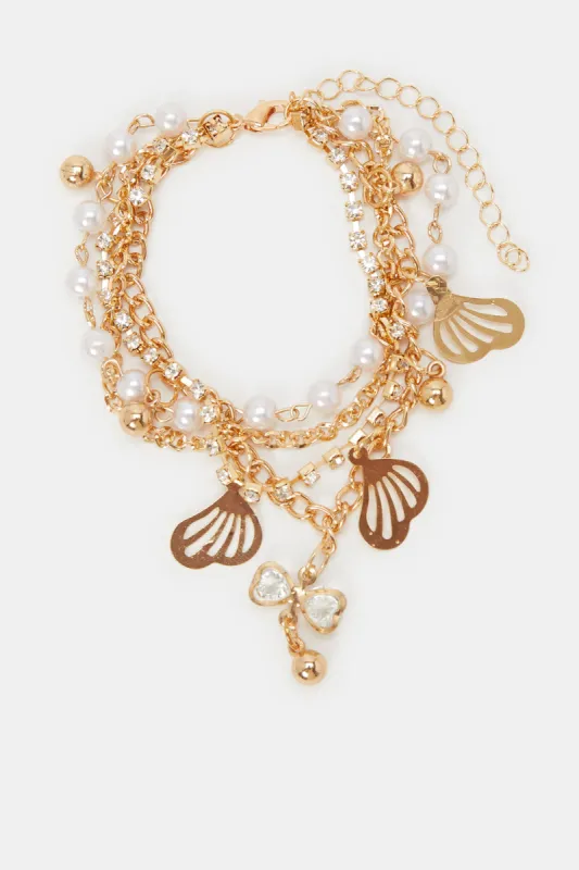 Women Gold Pearls Bracelet sold by Redtag