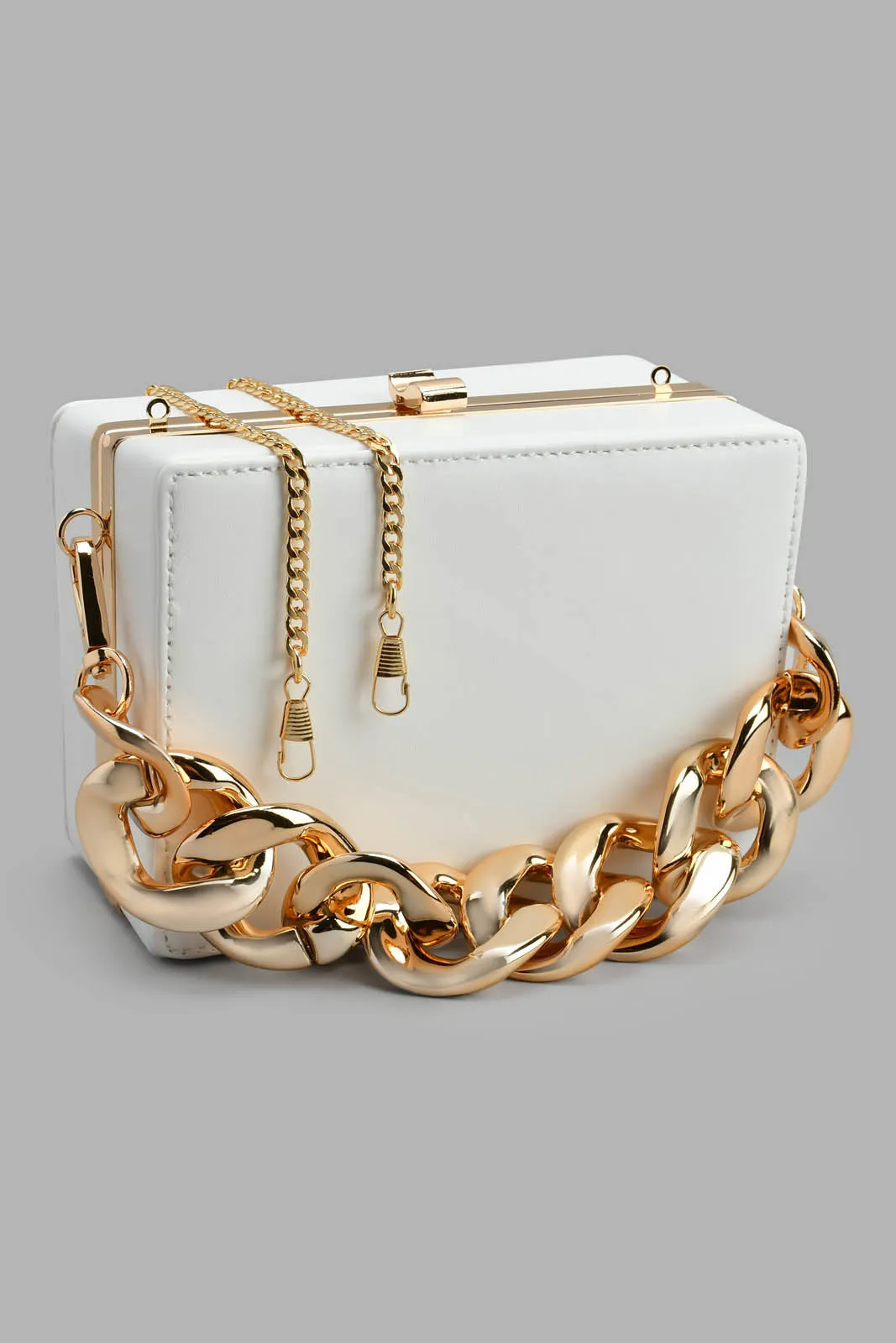 White Evening Clutch With Gold Chain sold by Redtag