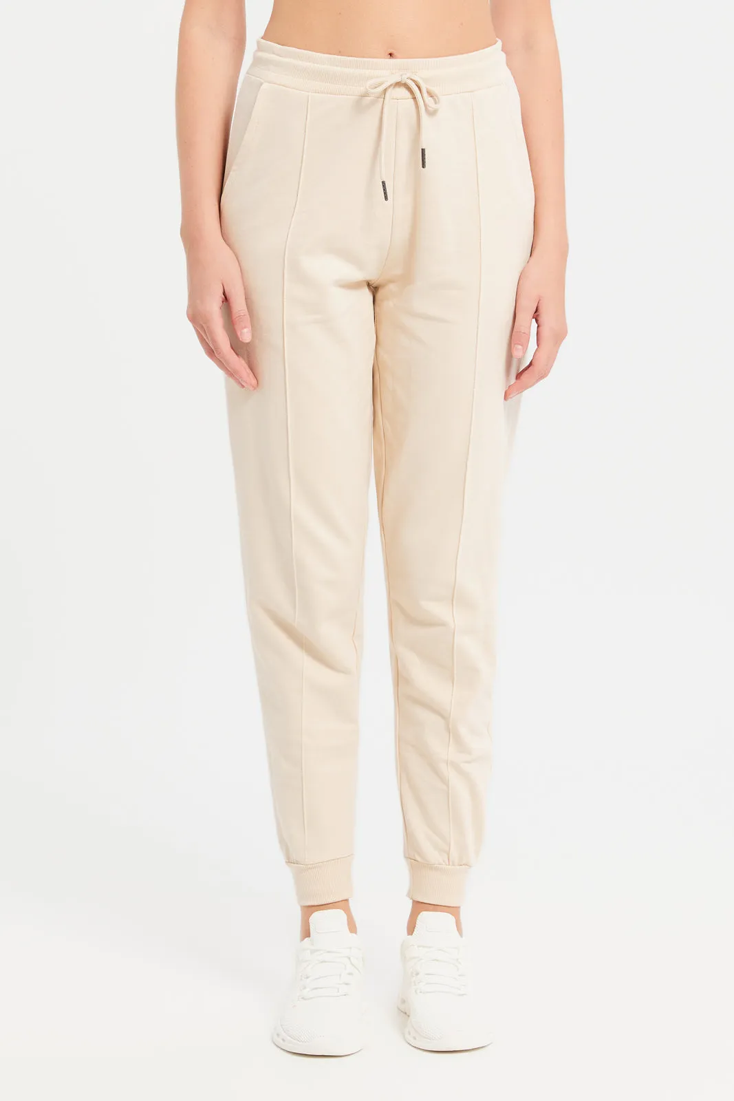 Women Beige Solid Jogger Pants With Pockets sold by Redtag