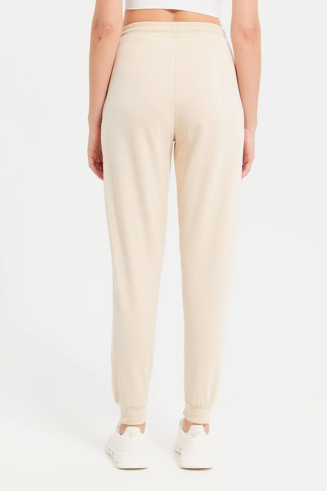 Women Beige Solid Jogger Pants With Pockets sold by Redtag product image thumbnail 3
