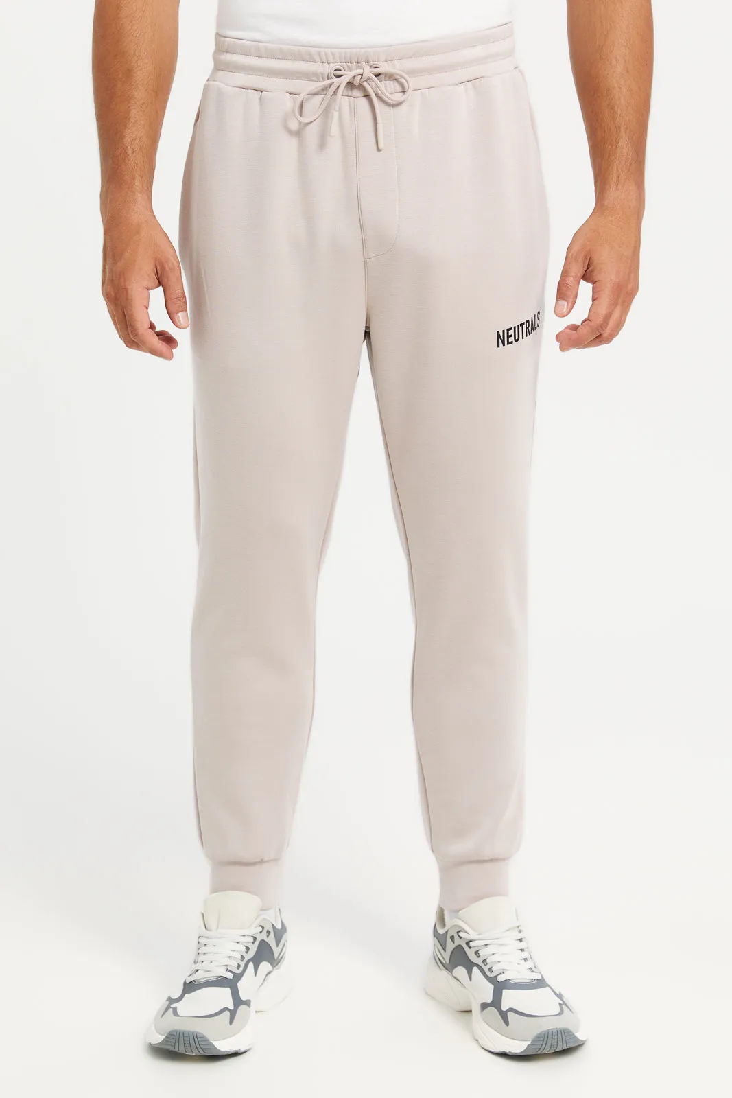 Men Beige Printed Active Pants sold by Redtag