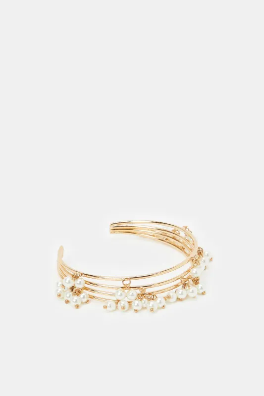 Women Gold Pearls Bracelet sold by Redtag