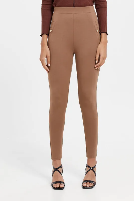 Women Beige Double Pocket Button Leggings sold by Redtag