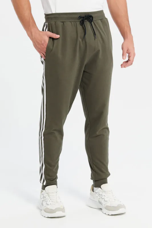 Men Olive Pique Active Pants sold by Redtag