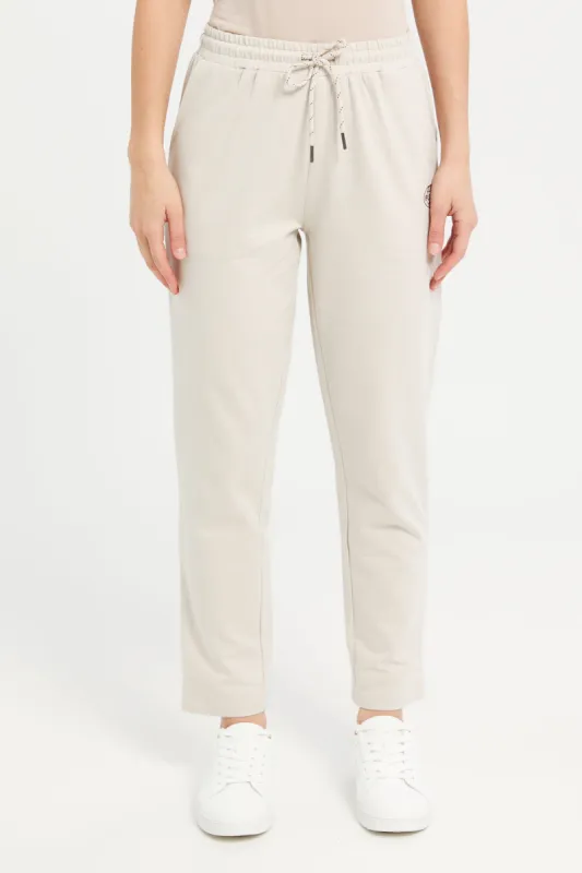 Women Beige Active Pants With Placement Print sold by Redtag