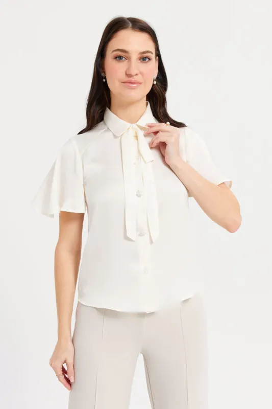 Women Ivory Solid Tie-Up Detailed Blouse sold by Redtag