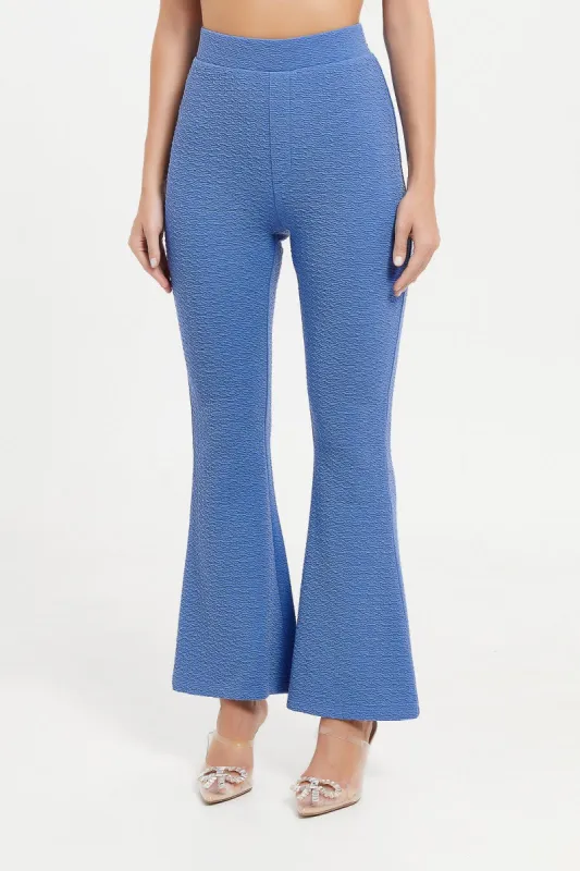 Women Blue Flare Textured Trouser sold by Redtag