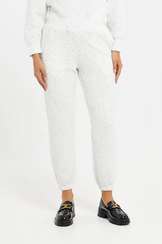 Women Grey Textured Pants sold by Redtag