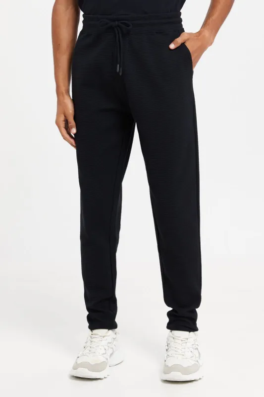 Men Black Plain Joggers sold by Redtag
