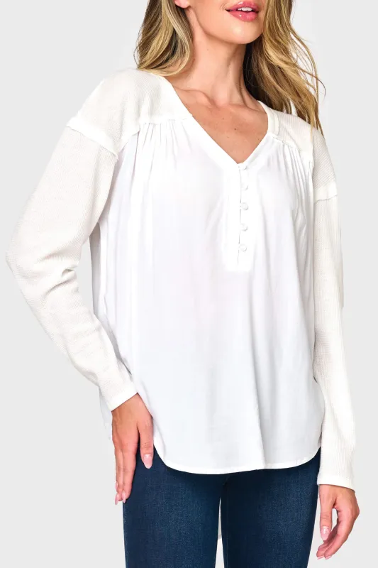 The Gemma Mixed Media Henley sold by Gibsonlook