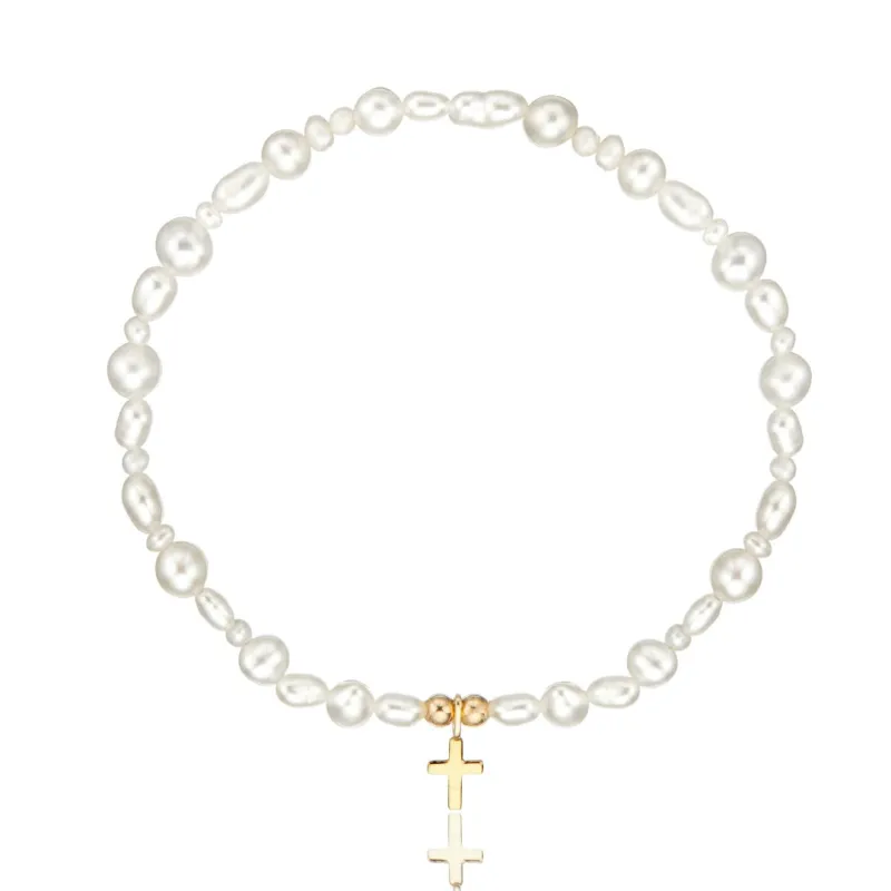 Solid Gold Pearl Tiny Cross Bracelet sold by Lily & Roo