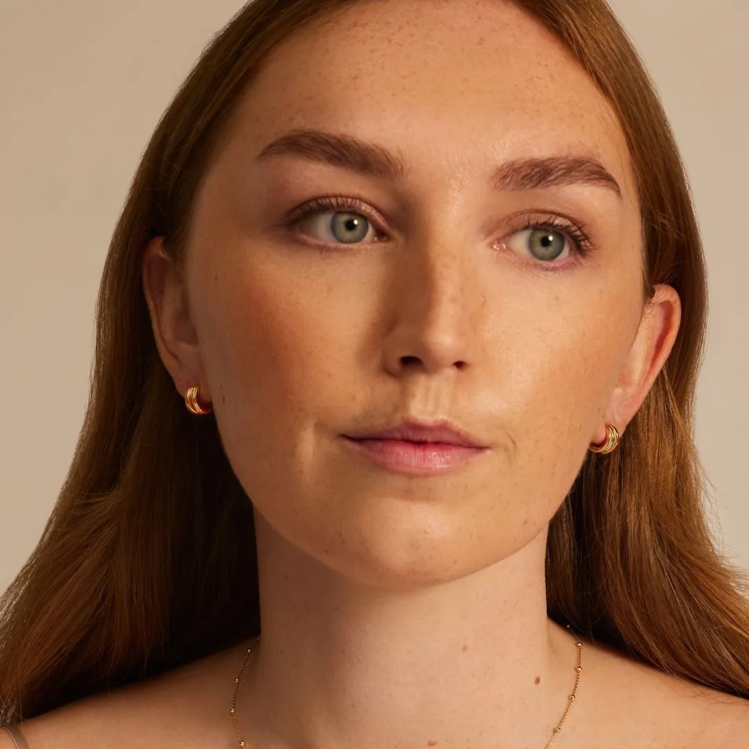 Gold Chunky Ribbed Huggie Hoop Earrings sold by Lily & Roo product image thumbnail 5