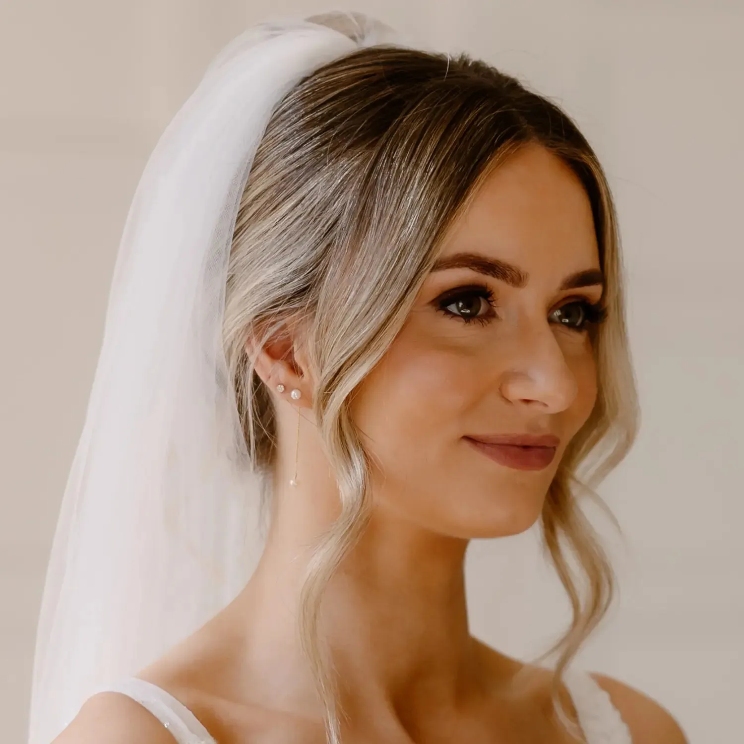 Gold Small Pearl Drop Stud Earrings sold by Lily & Roo product image thumbnail 4