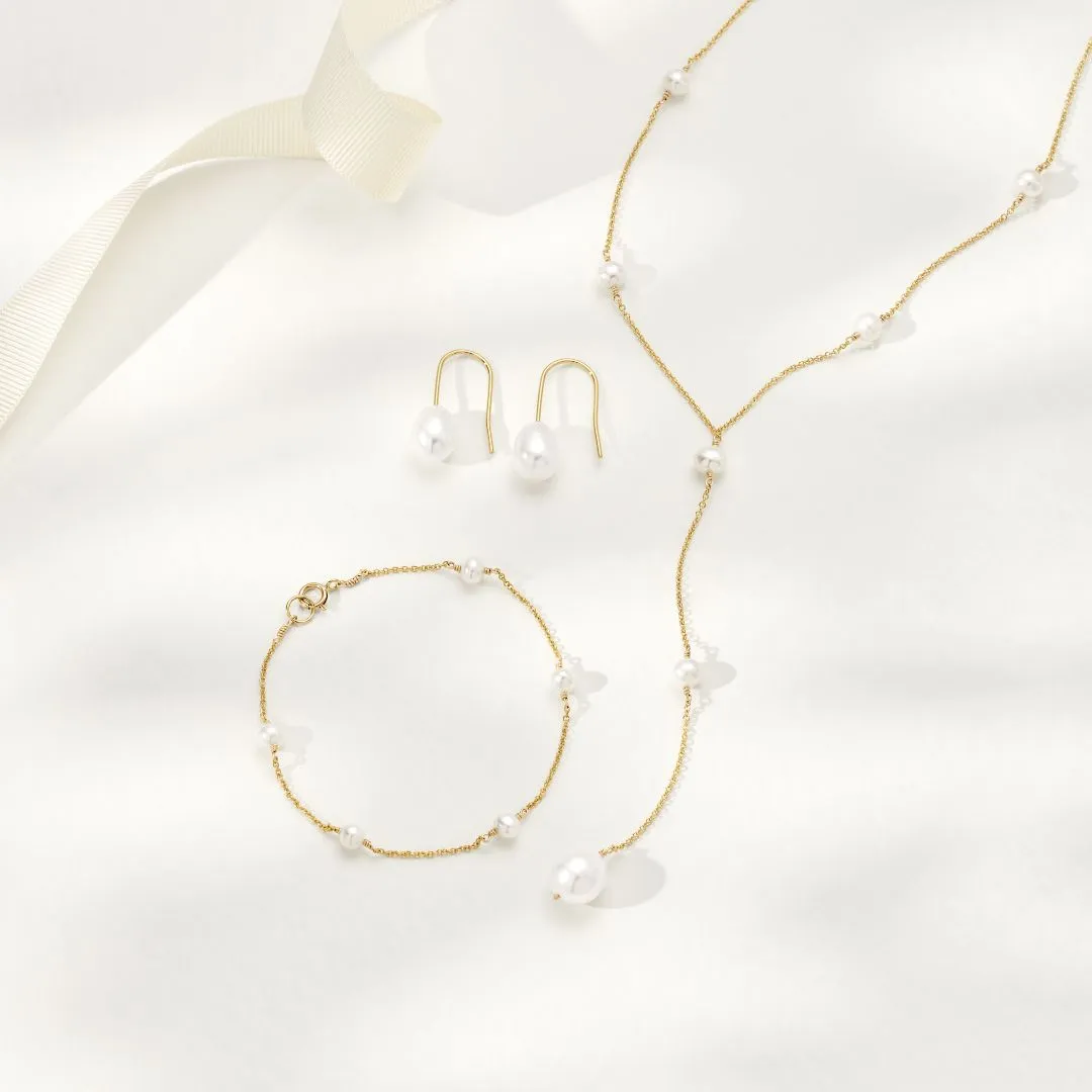 Gold Pearl Drop Hook Earrings sold by Lily & Roo product image thumbnail 5