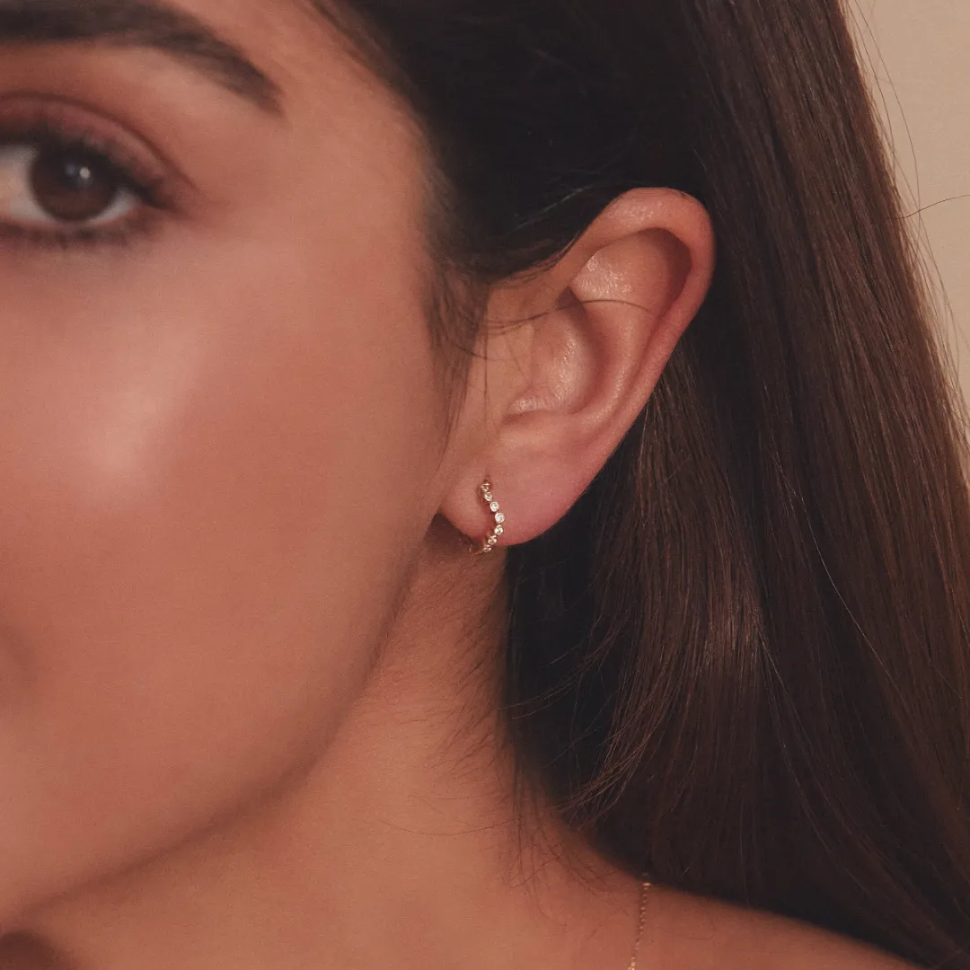 Gold Diamond Style Wave Huggie Hoop Earrings sold by Lily & Roo product image thumbnail 2