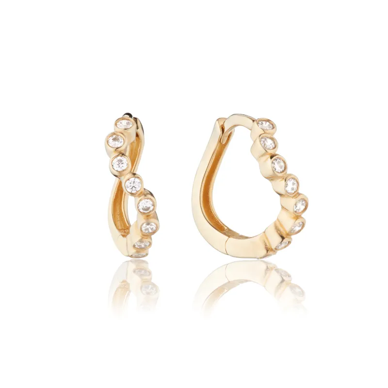 Gold Diamond Style Wave Huggie Hoop Earrings sold by Lily & Roo