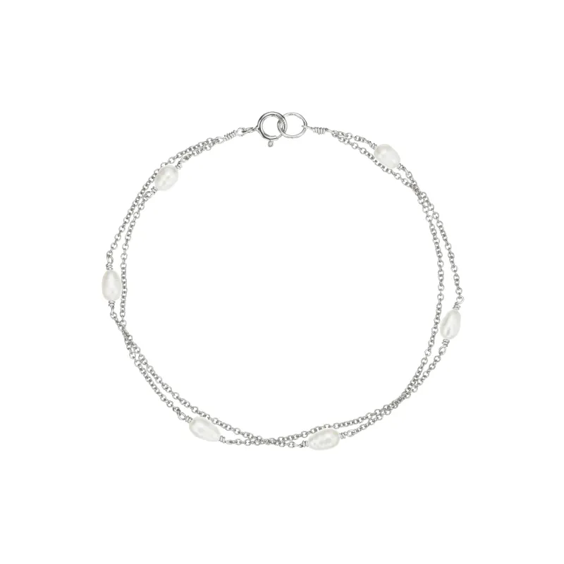 Silver Layered Seed Pearl Bracelet sold by Lily & Roo