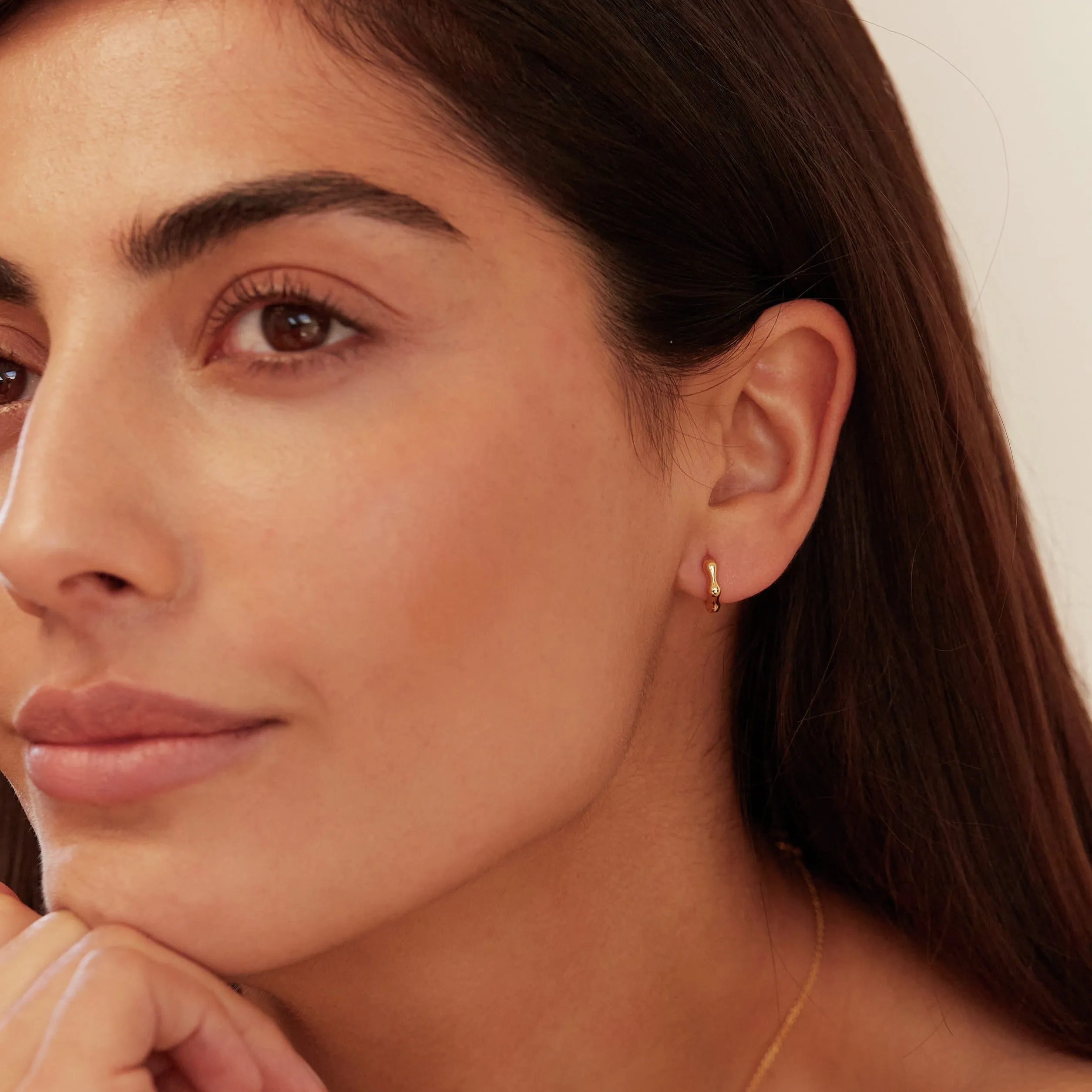 Gold Molten Huggie Hoop Earrings sold by Lily & Roo product image thumbnail 4