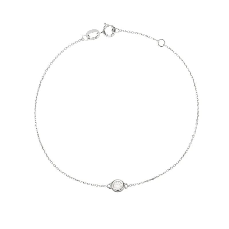 Solid White Gold Floating Diamond Bracelet sold by Lily & Roo