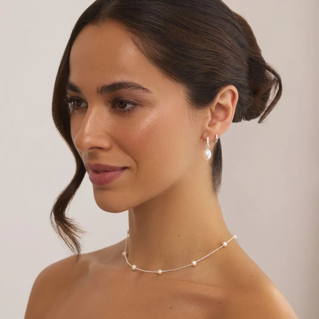 Silver Huggie Pearl Drop Earrings sold by Lily & Roo product image thumbnail 4