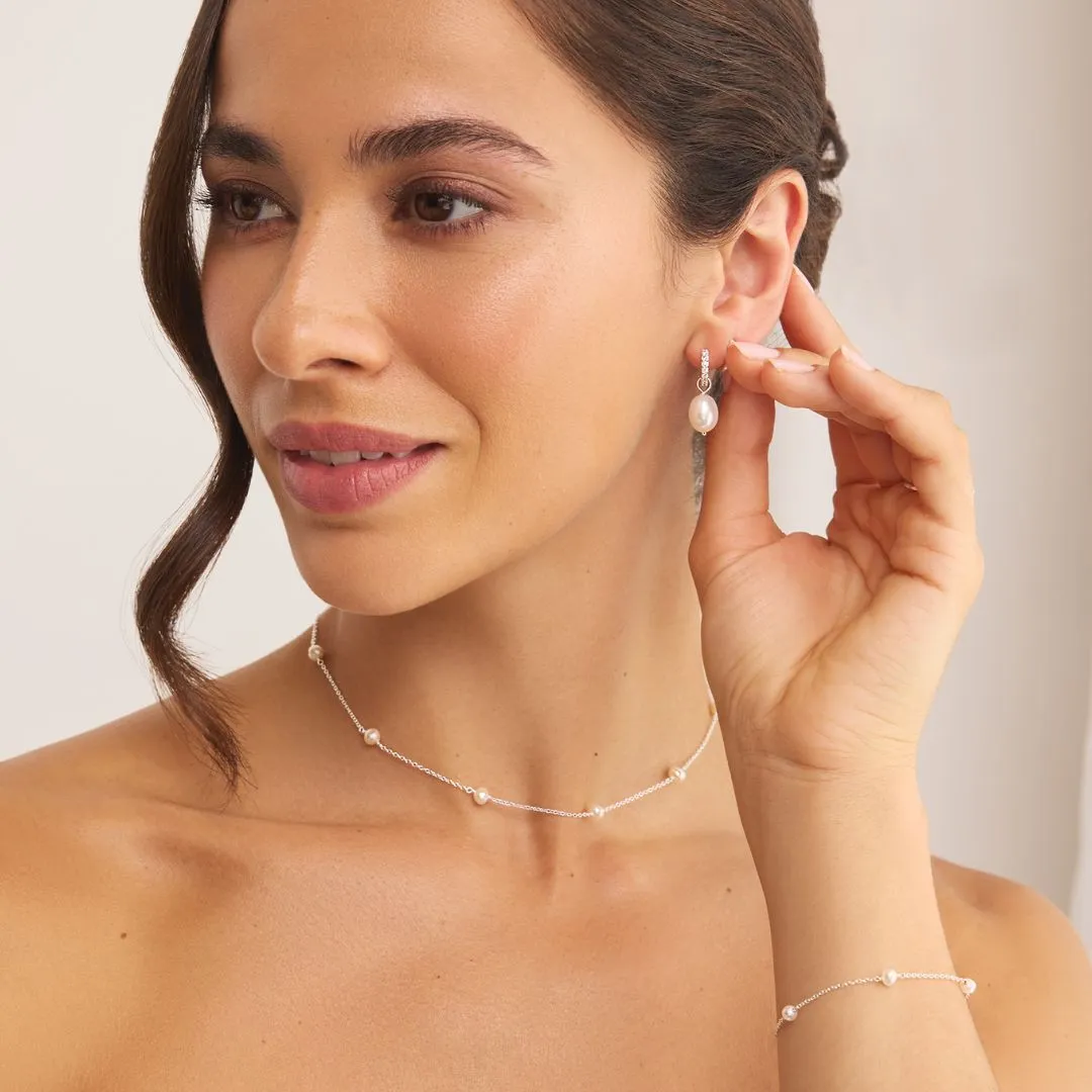 Silver Huggie Pearl Drop Earrings sold by Lily & Roo product image thumbnail 3