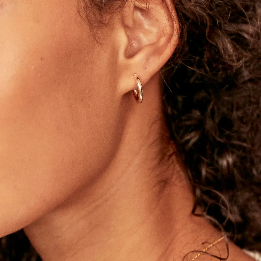 Solid Gold Small Rounded Hoop Earrings sold by Lily & Roo product image thumbnail 4