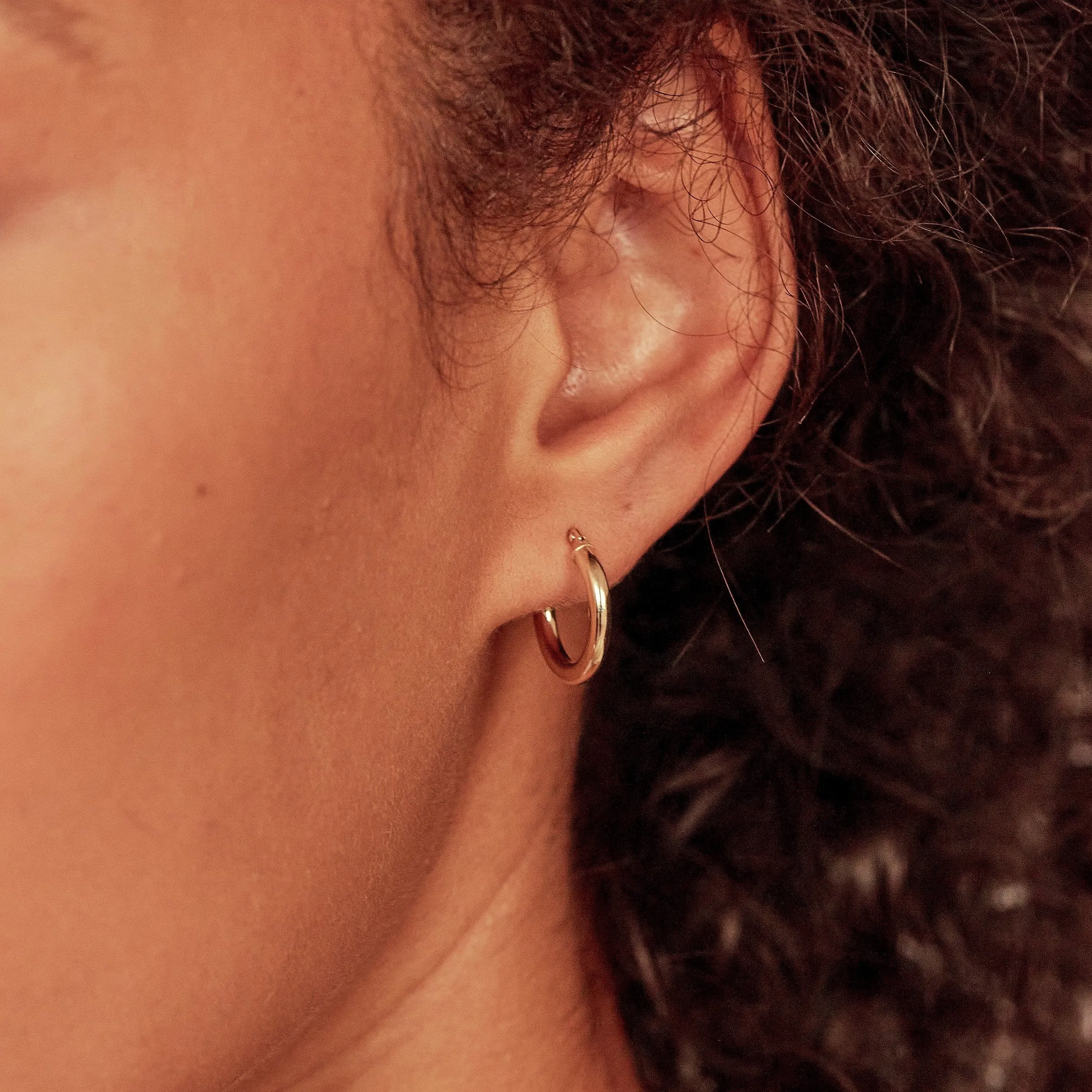 Silver Small Rounded Hoop Earrings sold by Lily & Roo product image thumbnail 4