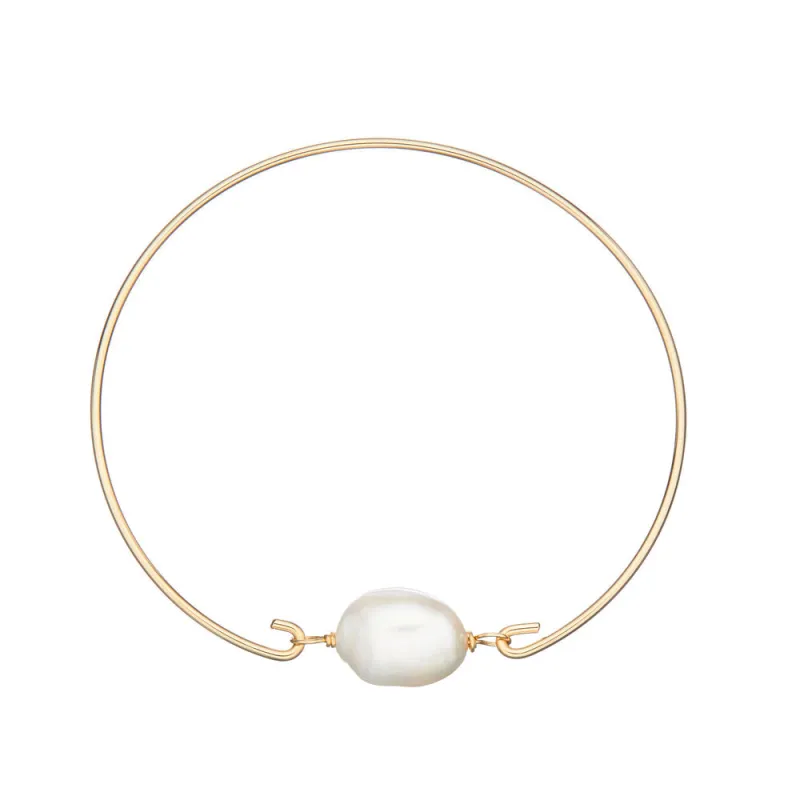 Gold Large Pearl Bangle sold by Lily & Roo