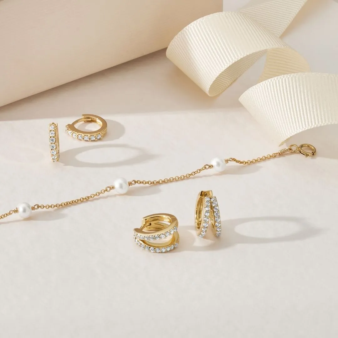 Solid Gold Genuine Diamond Huggie Hoop Earrings sold by Lily & Roo product image thumbnail 5