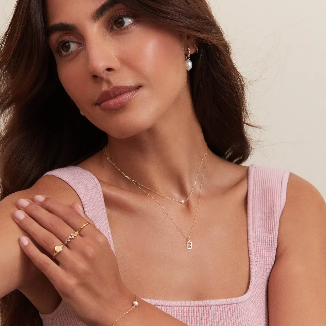 Gold Initial Letter Necklace sold by Lily & Roo product image thumbnail 4