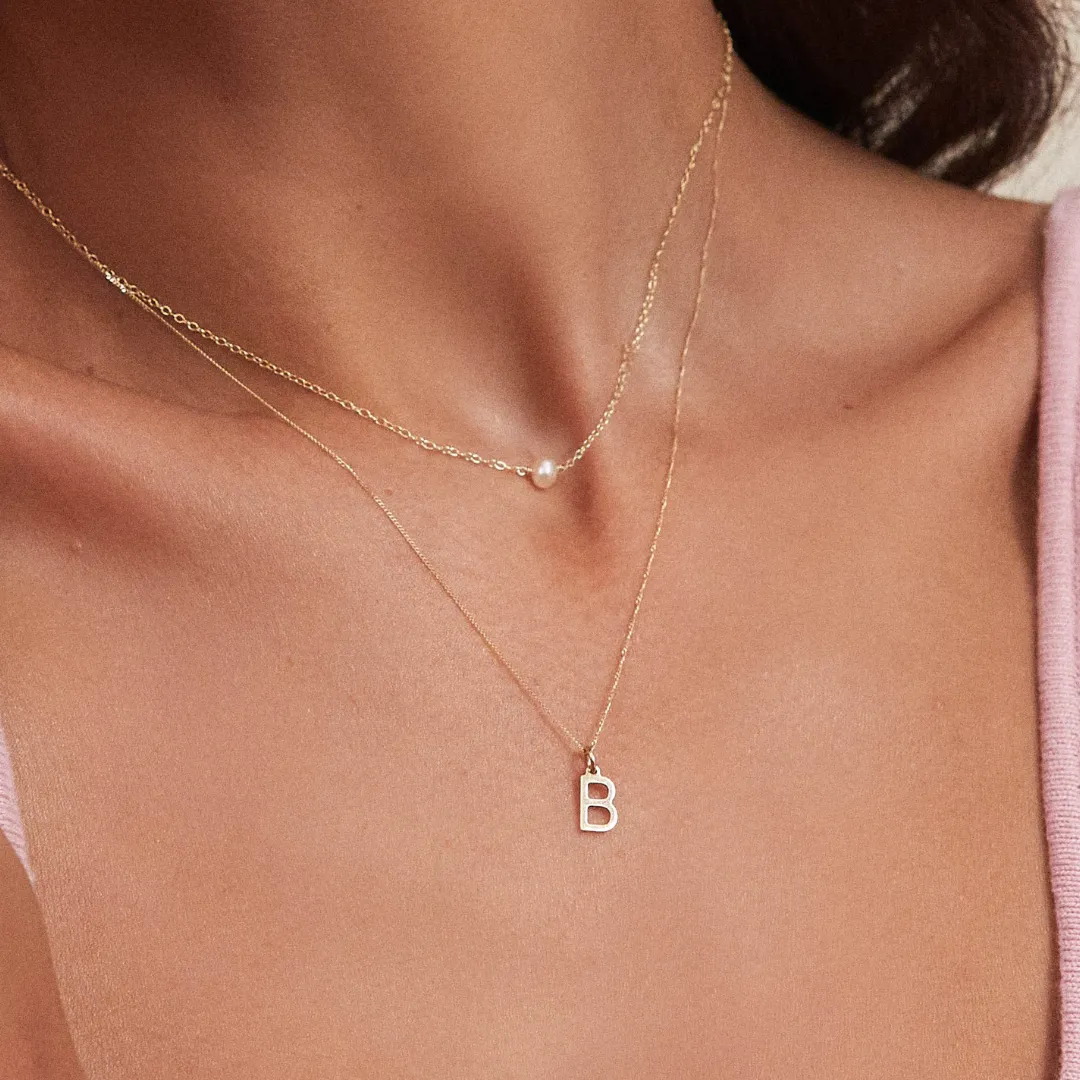 Gold Initial Letter Necklace sold by Lily & Roo product image thumbnail 3