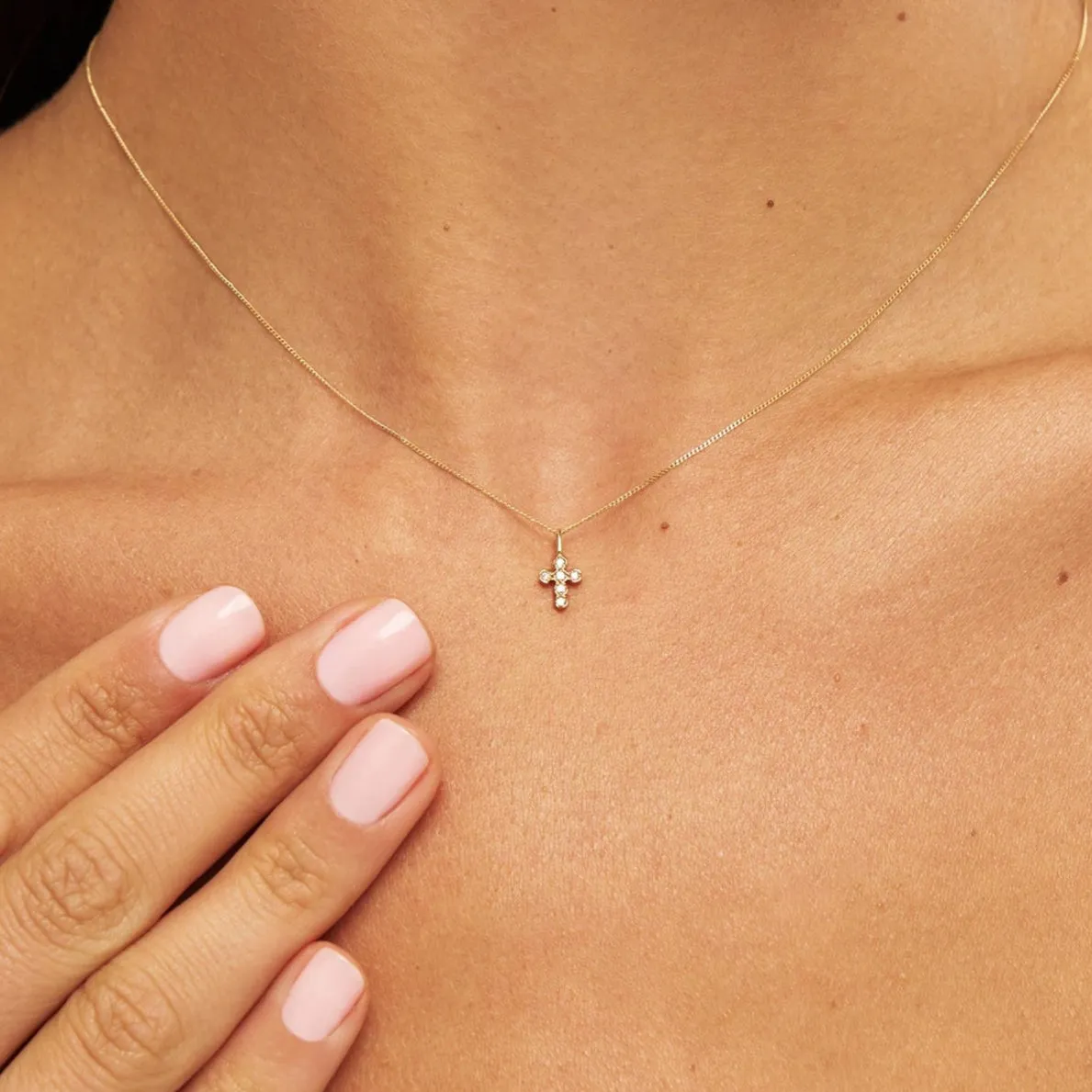Gold Diamond Style Rounded Tiny Cross Necklace sold by Lily & Roo product image thumbnail 2