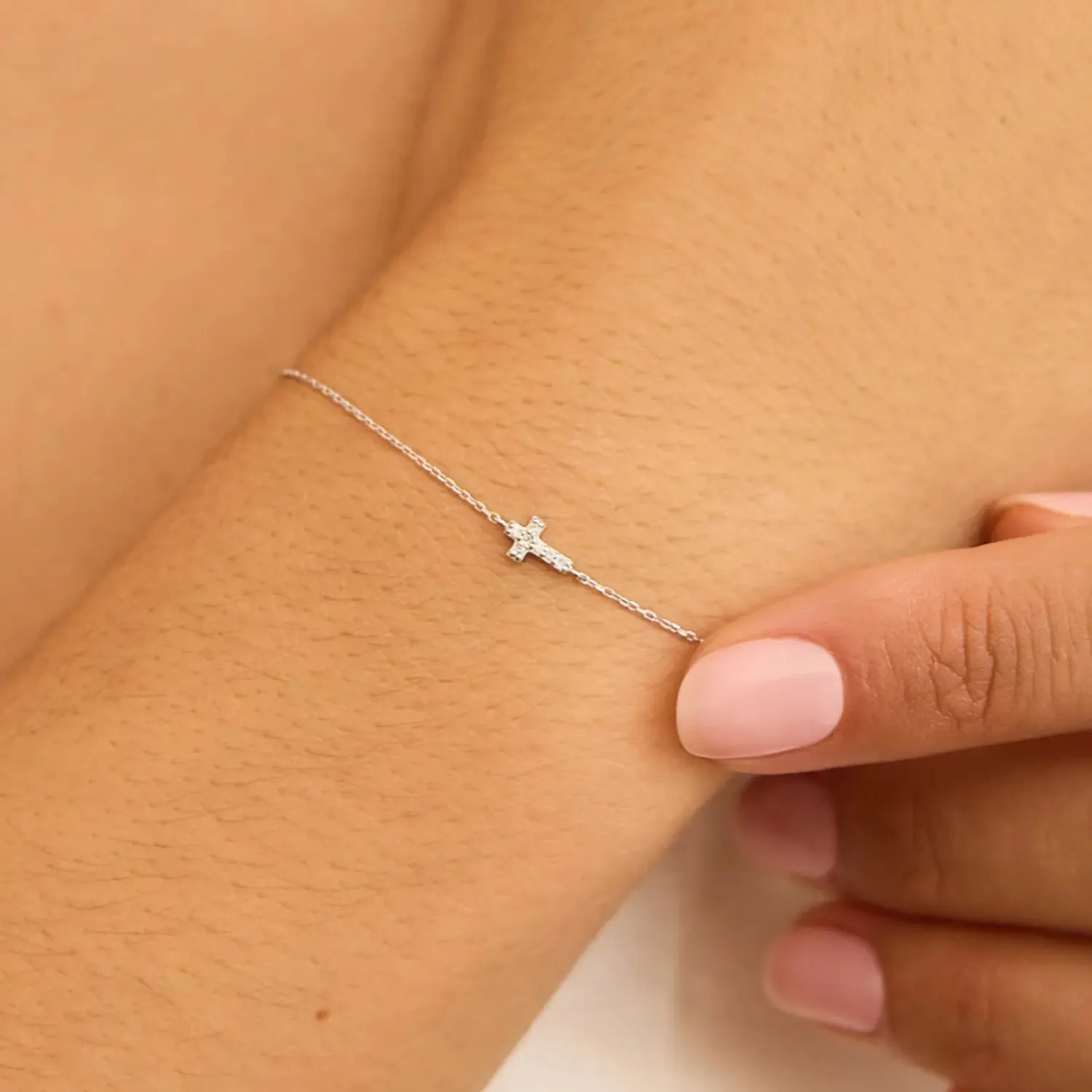 Silver Diamond Style Tiny Cross Bracelet sold by Lily & Roo product image thumbnail 2