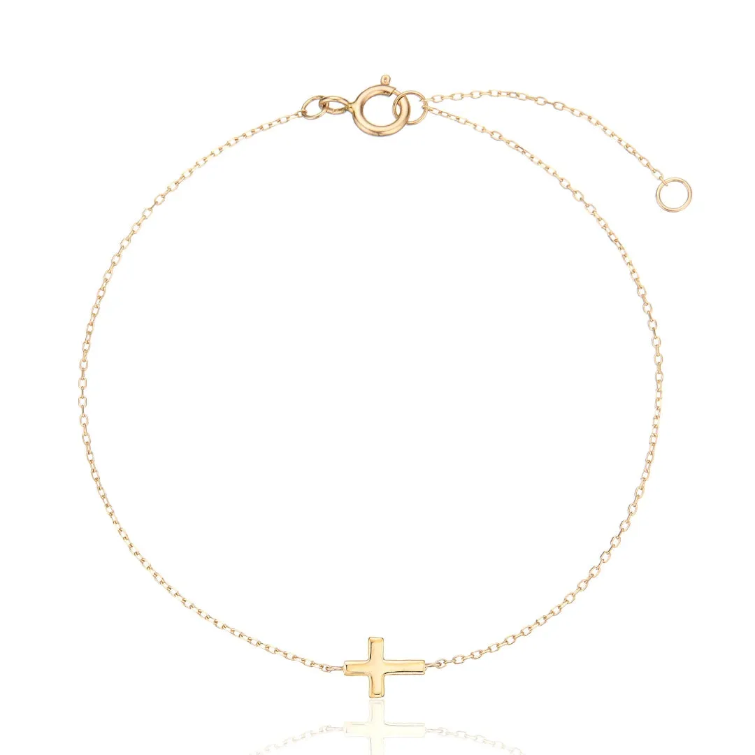 Gold Tiny Cross Bracelet sold by Lily & Roo