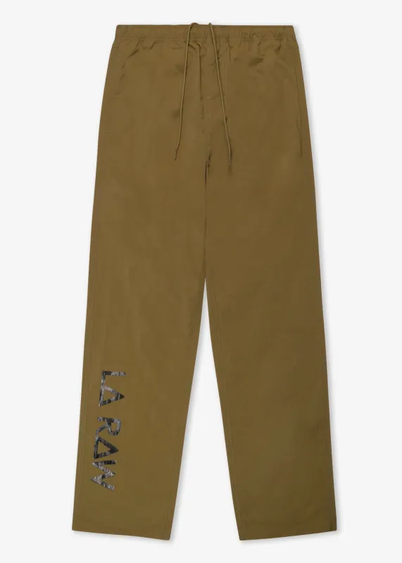 NYLON TRACK PANTS sold by LA Raw
