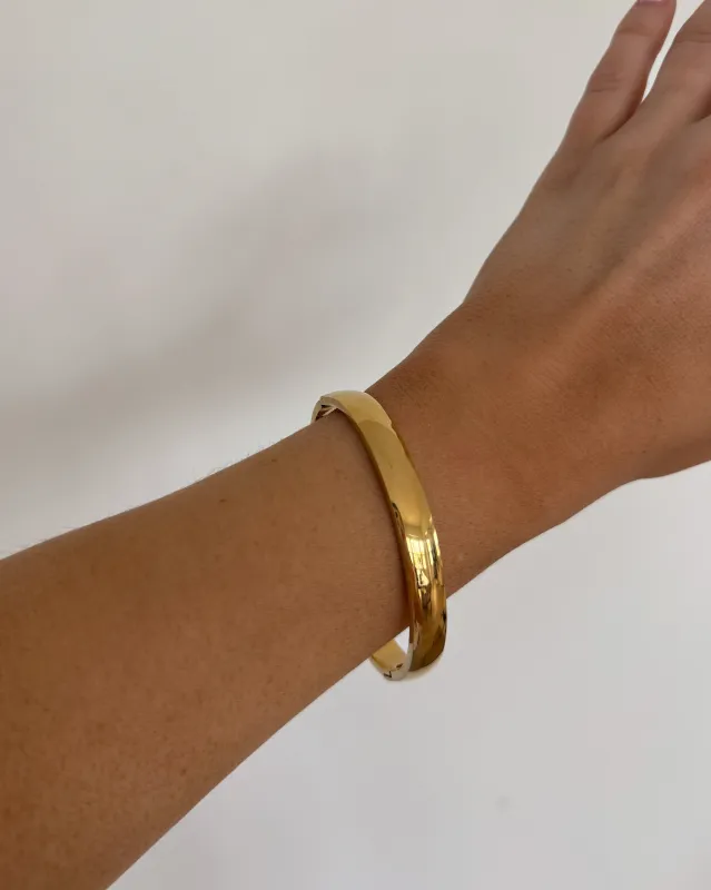 Tatum Gold Bangle sold by Grey Bandit