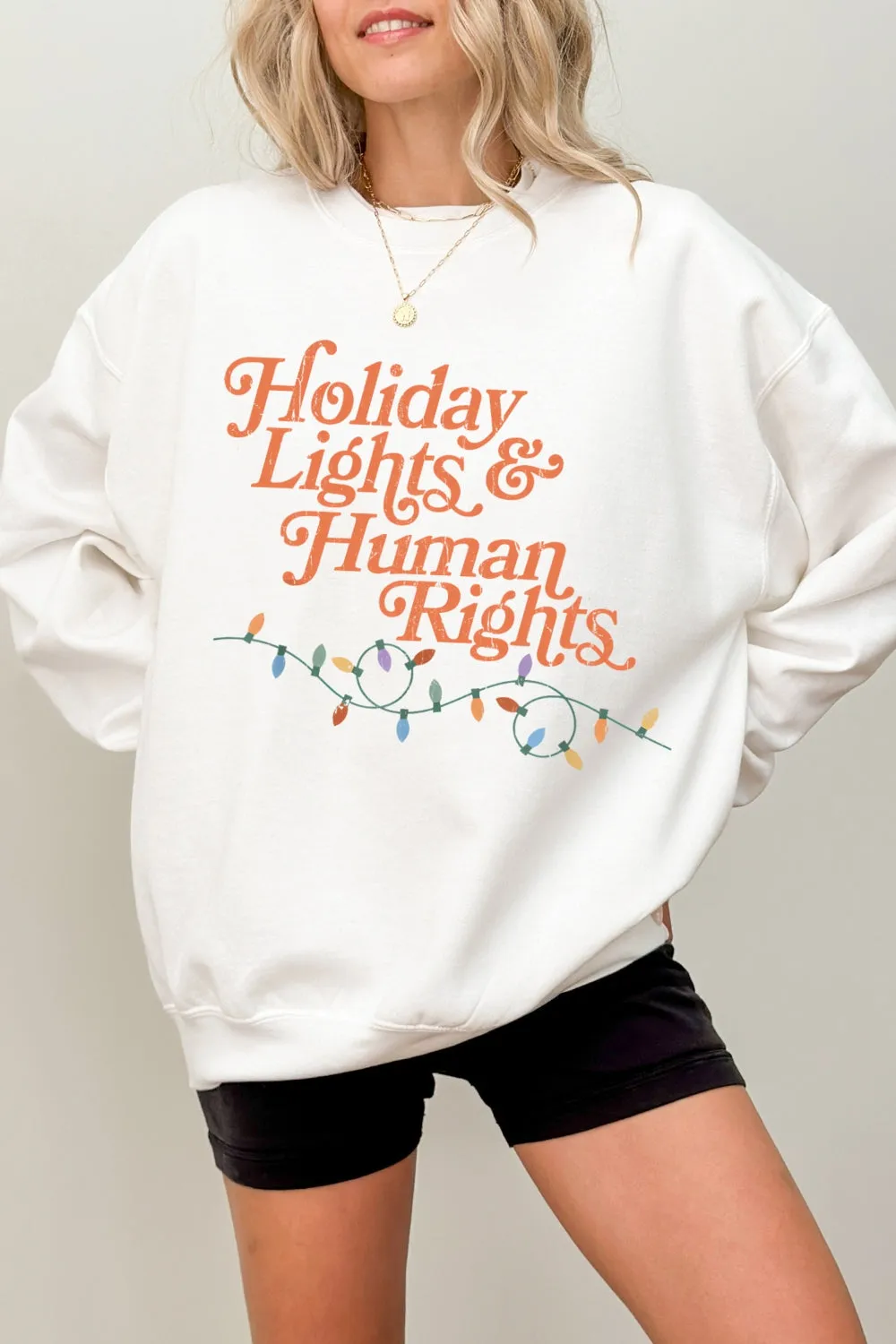 Holiday Lights And Human Rights Sweatshirt For Women sold by Fancy Tees product image thumbnail 4