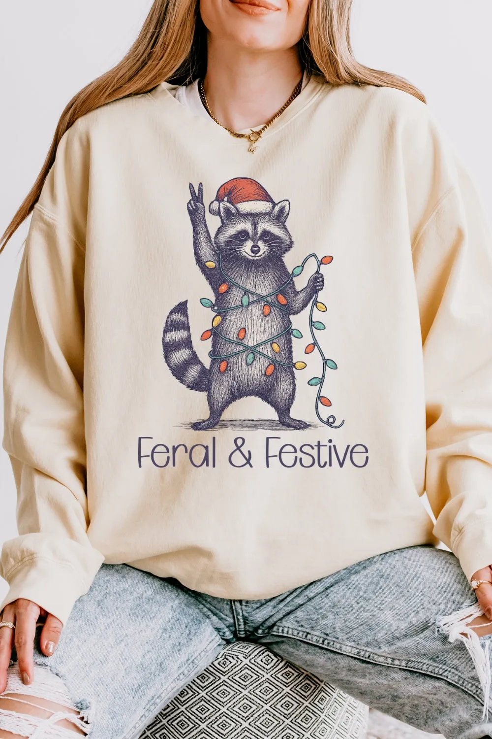 Feral and Festive Christmas Raccoon Sweatshirt For Women sold by Fancy Tees